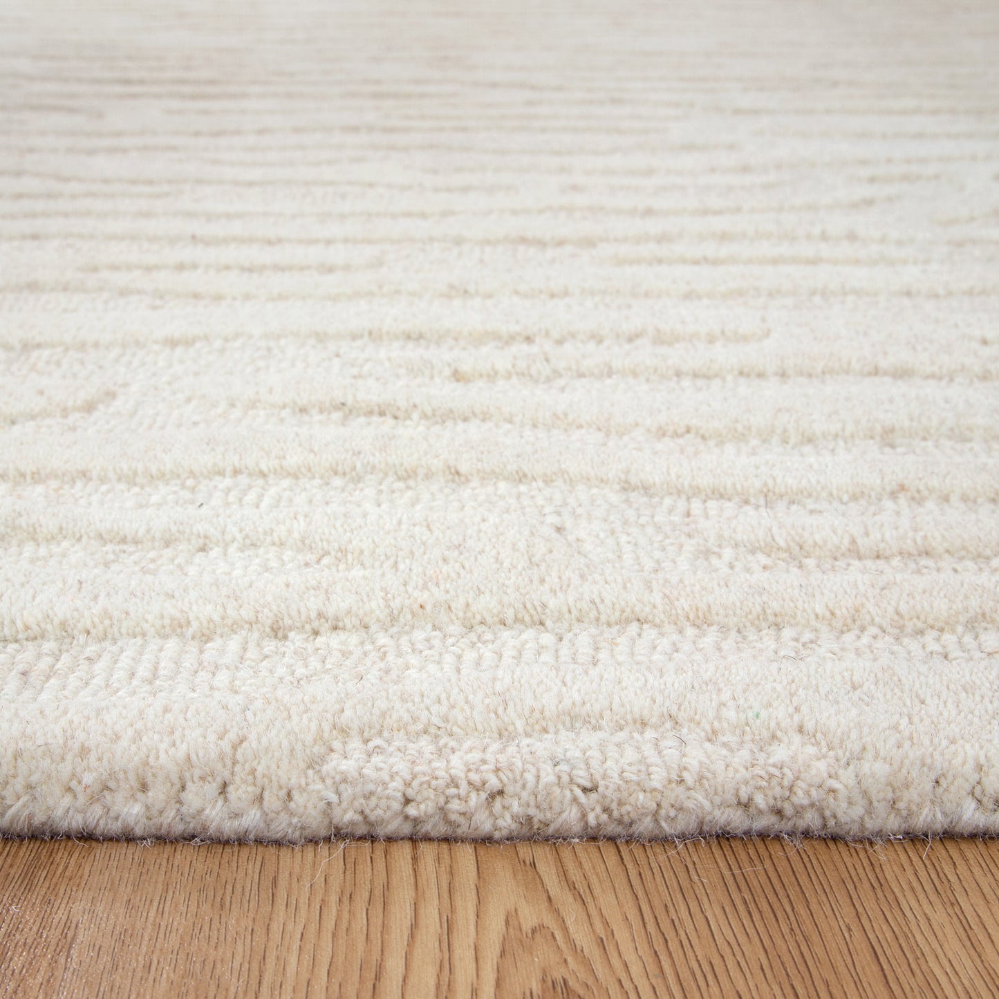 Les Nomades Sandstorm Cream Wool Rug